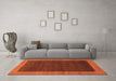 Machine Washable Abstract Orange Modern Area Rugs in a Living Room, wshabs1534org