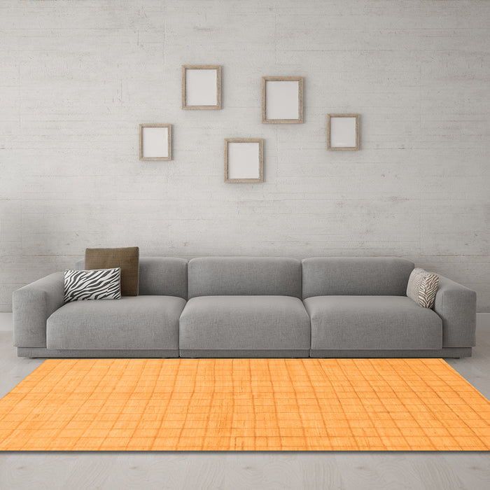 Machine Washable Solid Orange Modern Area Rugs in a Living Room, wshabs1537org