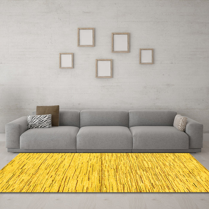 Machine Washable Solid Yellow Modern Rug in a Living Room, wshabs1544yw