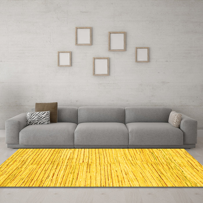 Machine Washable Solid Yellow Modern Rug in a Living Room, wshabs1545yw