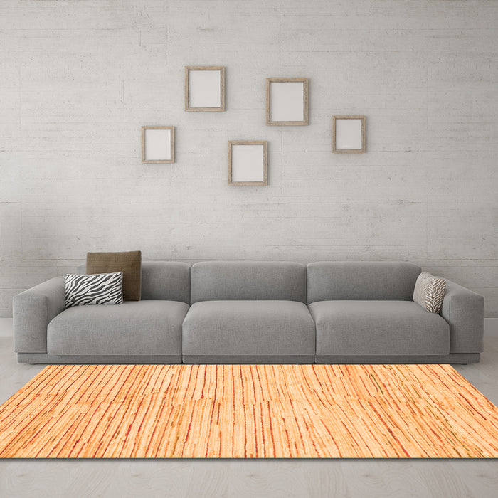 Machine Washable Solid Orange Modern Area Rugs in a Living Room, wshabs1545org