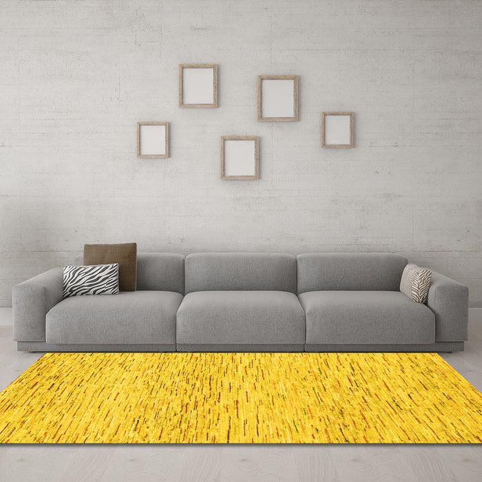 Machine Washable Solid Yellow Modern Rug in a Living Room, wshabs1546yw