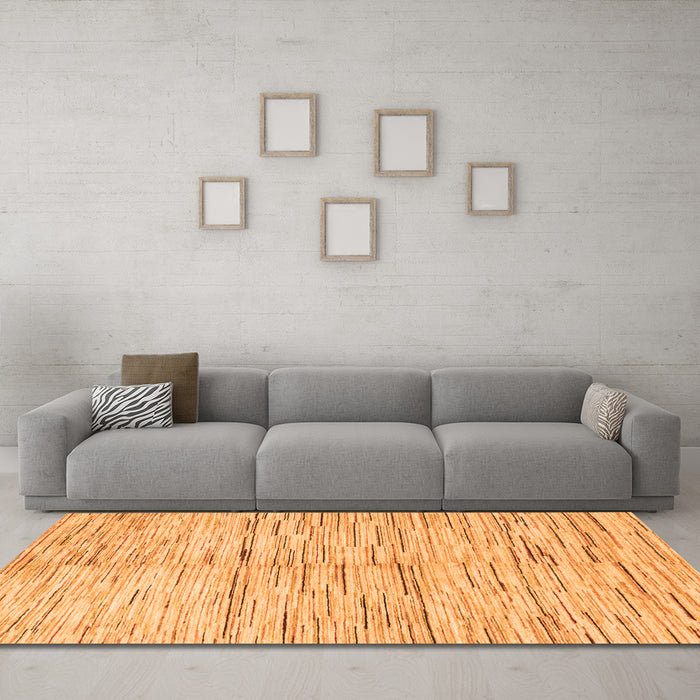 Machine Washable Solid Orange Modern Area Rugs in a Living Room, wshabs1550org