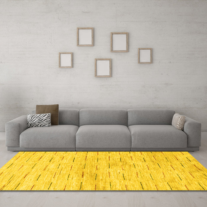 Machine Washable Solid Yellow Modern Rug in a Living Room, wshabs1552yw