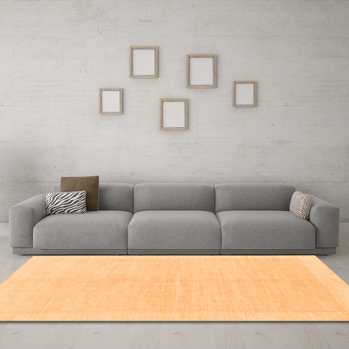 Machine Washable Solid Orange Modern Area Rugs in a Living Room, wshabs1559org