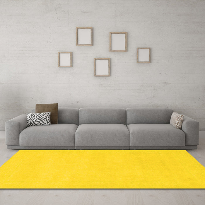 Machine Washable Solid Yellow Modern Rug in a Living Room, wshabs155yw