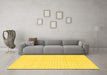 Machine Washable Solid Yellow Modern Rug in a Living Room, wshabs1563yw