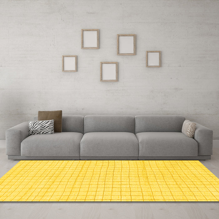 Machine Washable Solid Yellow Modern Rug in a Living Room, wshabs1563yw
