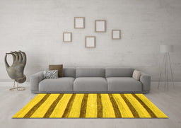 Machine Washable Solid Yellow Modern Rug in a Living Room, wshabs1564yw
