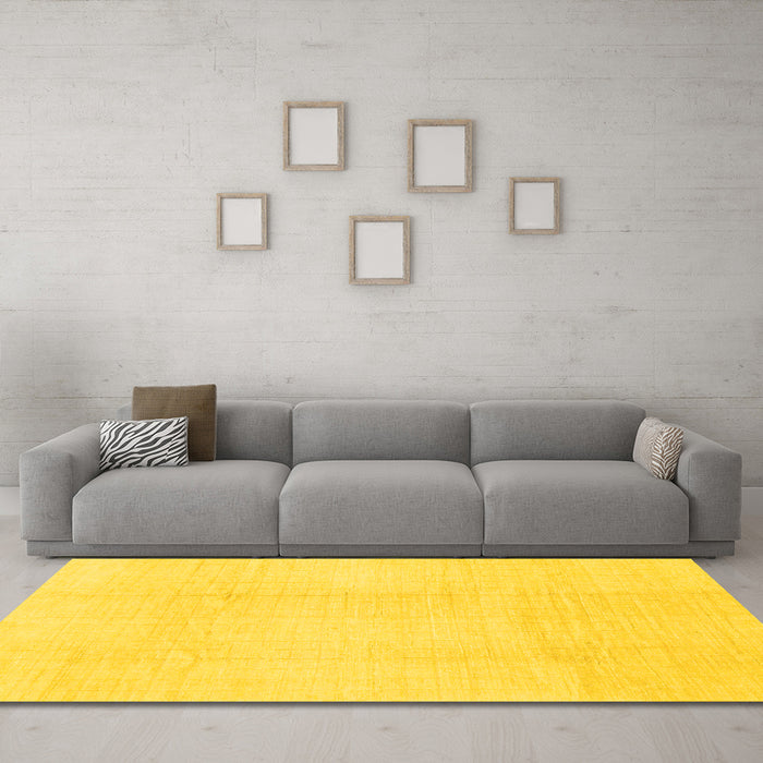Machine Washable Solid Yellow Modern Rug in a Living Room, wshabs1566yw
