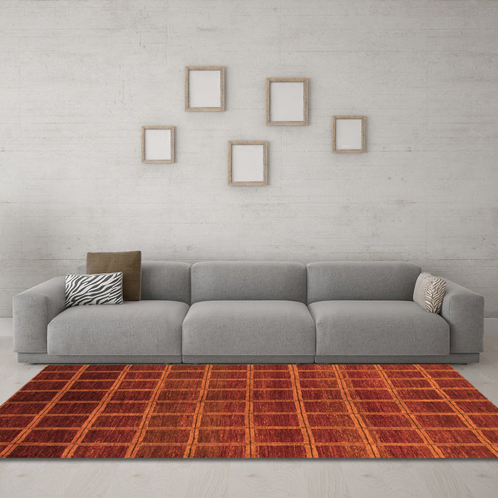 Machine Washable Abstract Orange Modern Area Rugs in a Living Room, wshabs1581org