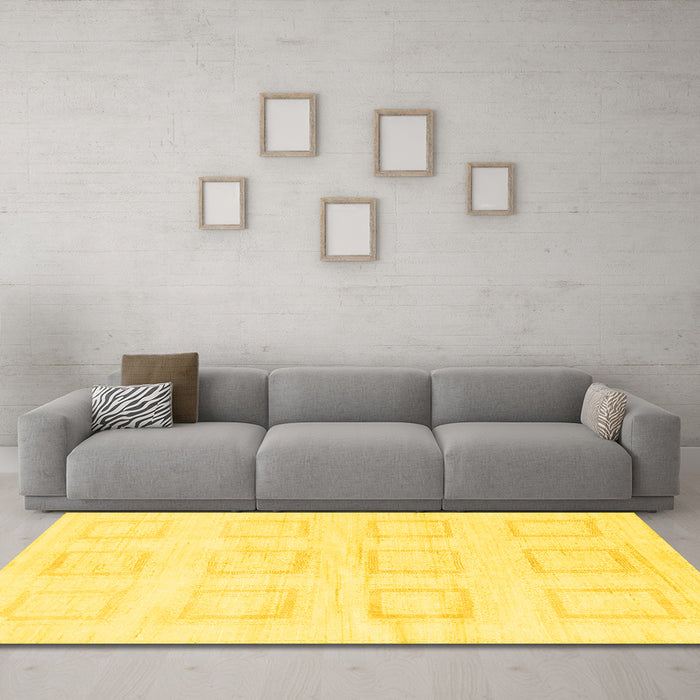Machine Washable Solid Yellow Modern Rug in a Living Room, wshabs1588yw