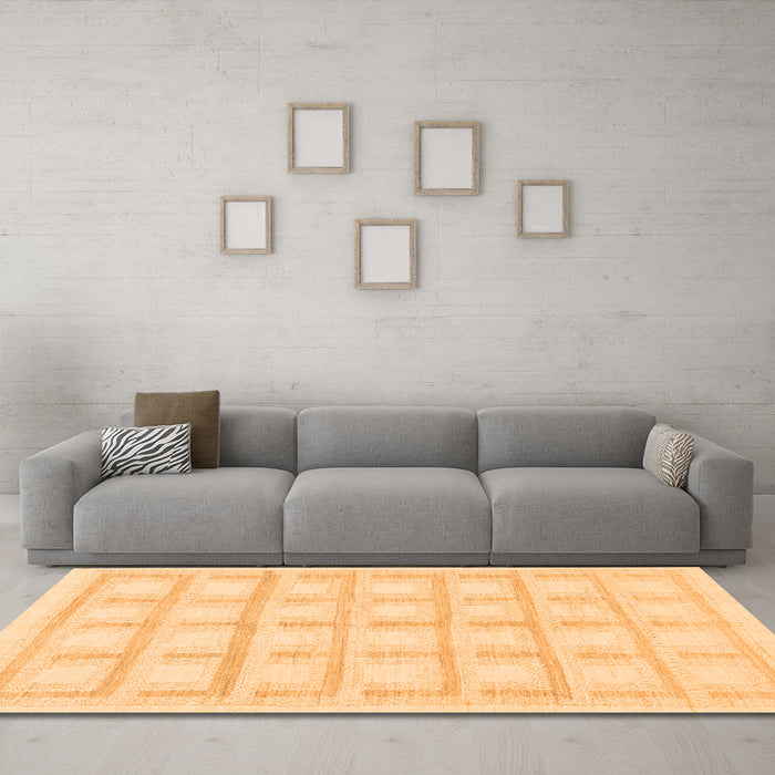 Machine Washable Solid Orange Modern Area Rugs in a Living Room, wshabs1590org