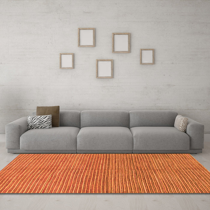 Machine Washable Abstract Orange Modern Area Rugs in a Living Room, wshabs1591org