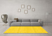 Machine Washable Solid Yellow Modern Rug in a Living Room, wshabs1595yw