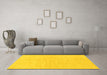 Machine Washable Solid Yellow Modern Rug in a Living Room, wshabs1597yw