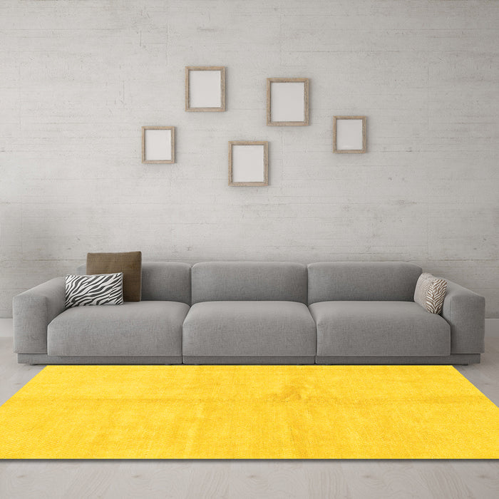 Machine Washable Solid Yellow Modern Rug in a Living Room, wshabs1598yw