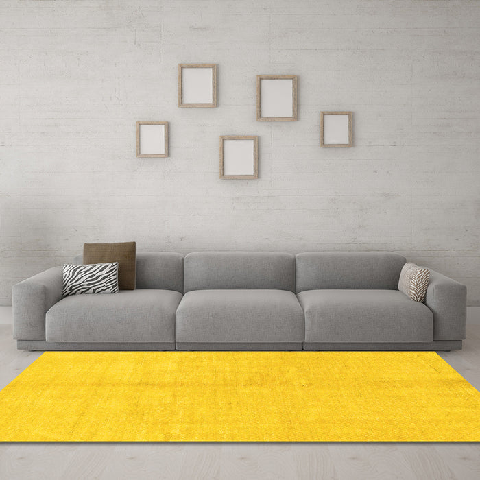 Machine Washable Solid Yellow Modern Rug in a Living Room, wshabs1600yw