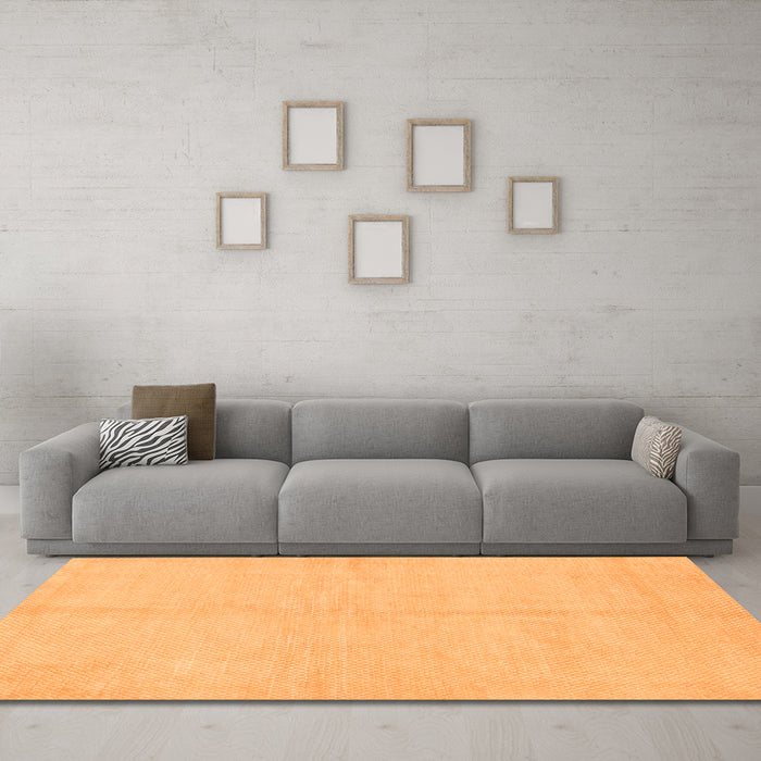 Machine Washable Solid Orange Modern Area Rugs in a Living Room, wshabs1601org