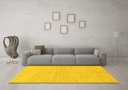 Machine Washable Solid Yellow Modern Rug in a Living Room, wshabs1602yw
