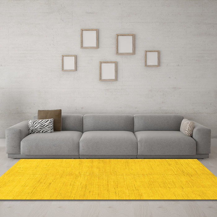 Machine Washable Solid Yellow Modern Rug in a Living Room, wshabs1602yw