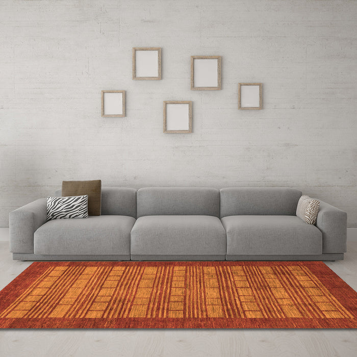 Machine Washable Abstract Orange Modern Area Rugs in a Living Room, wshabs1615org
