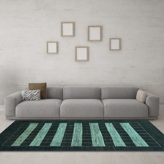 Machine Washable Abstract Light Blue Modern Rug in a Living Room, wshabs1616lblu