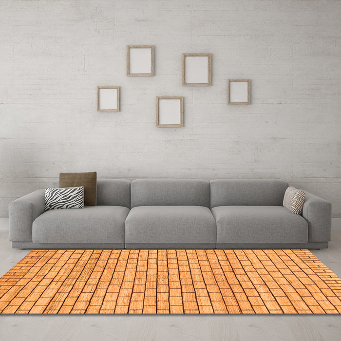 Machine Washable Solid Orange Modern Area Rugs in a Living Room, wshabs1631org