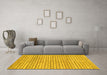 Machine Washable Solid Yellow Modern Rug in a Living Room, wshabs1631yw