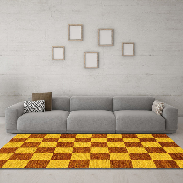 Machine Washable Checkered Yellow Modern Rug in a Living Room, wshabs1697yw