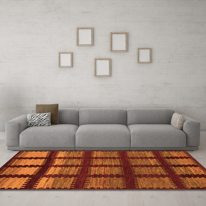Machine Washable Abstract Orange Modern Area Rugs in a Living Room, wshabs1698org