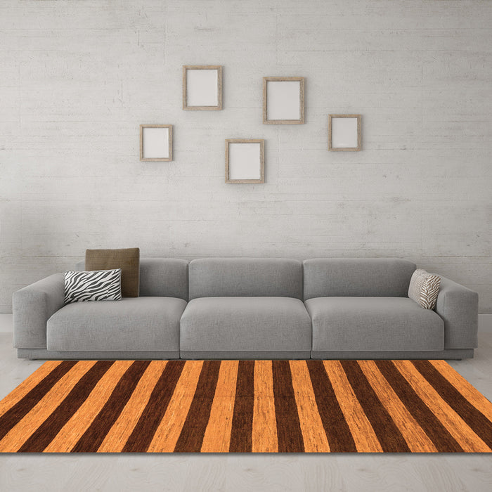 Machine Washable Abstract Orange Modern Area Rugs in a Living Room, wshabs1700org