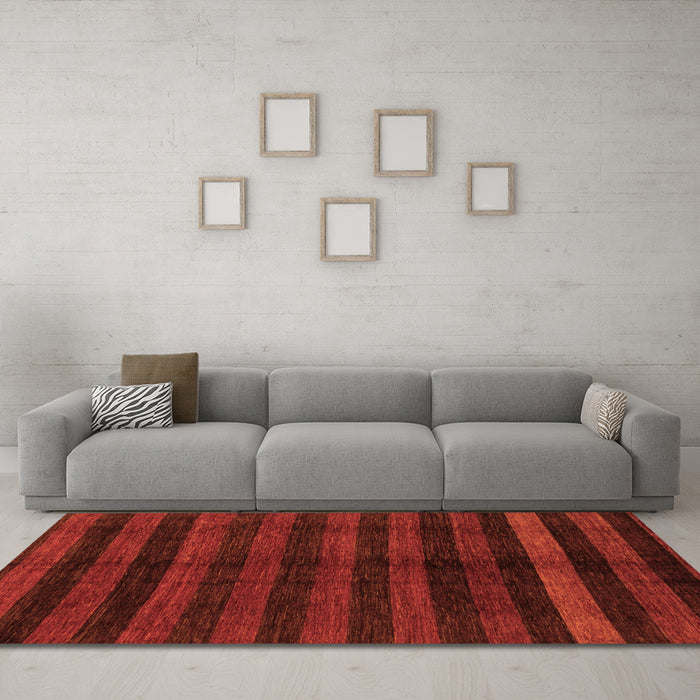 Machine Washable Abstract Orange Modern Area Rugs in a Living Room, wshabs1712org