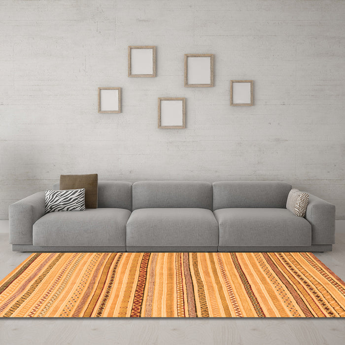Machine Washable Solid Orange Modern Area Rugs in a Living Room, wshabs1782org