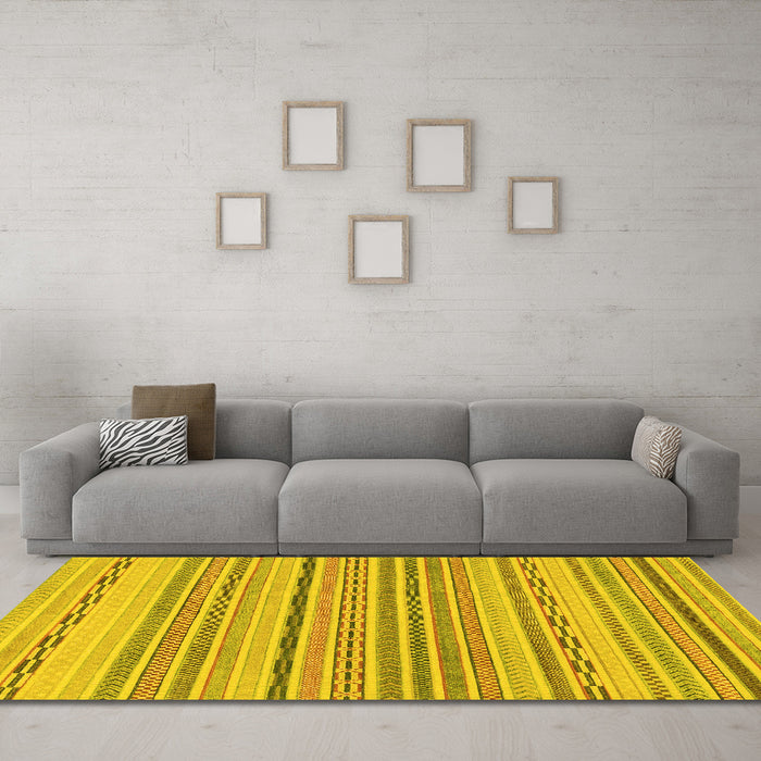 Machine Washable Solid Yellow Modern Rug in a Living Room, wshabs1784yw