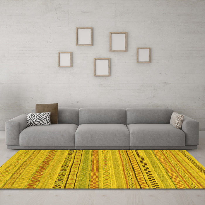 Machine Washable Solid Yellow Modern Rug in a Living Room, wshabs1785yw