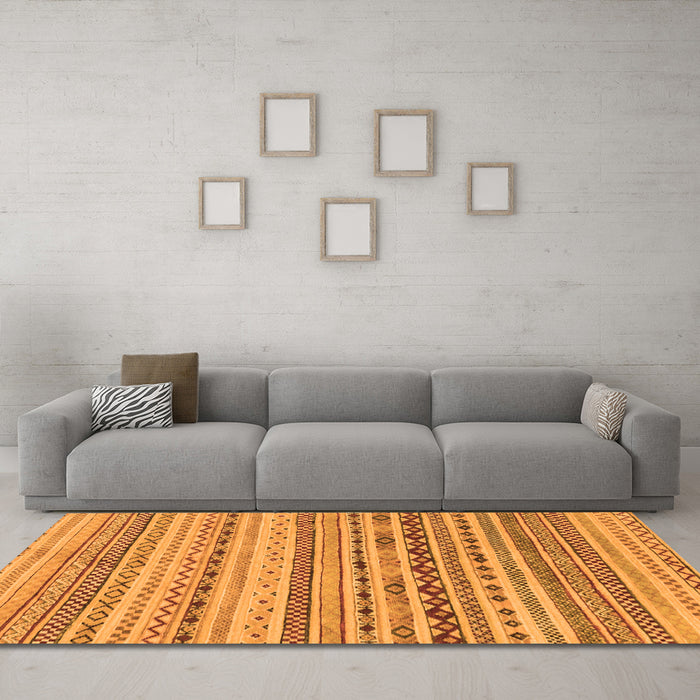 Machine Washable Solid Orange Modern Area Rugs in a Living Room, wshabs1786org
