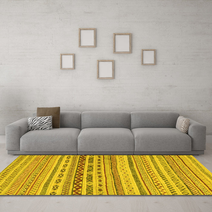 Machine Washable Solid Yellow Modern Rug in a Living Room, wshabs1787yw