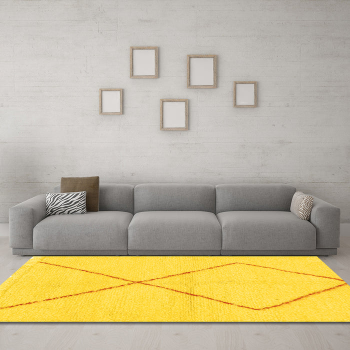Machine Washable Solid Yellow Modern Rug in a Living Room, wshabs1799yw