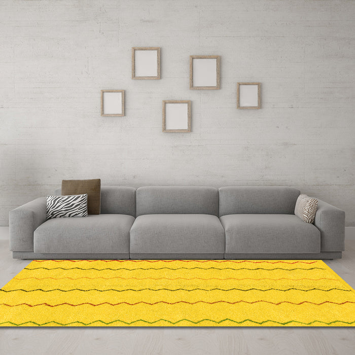 Machine Washable Solid Yellow Modern Rug in a Living Room, wshabs1801yw