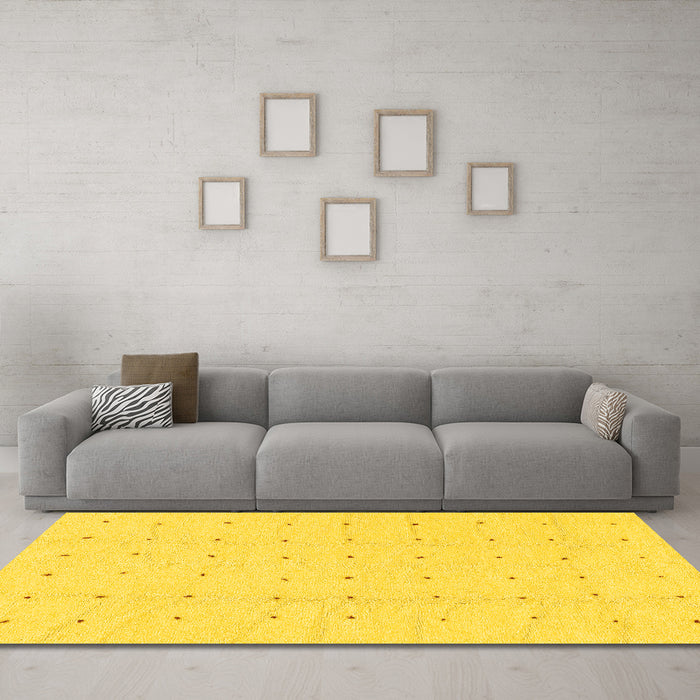 Machine Washable Solid Yellow Modern Rug in a Living Room, wshabs1803yw