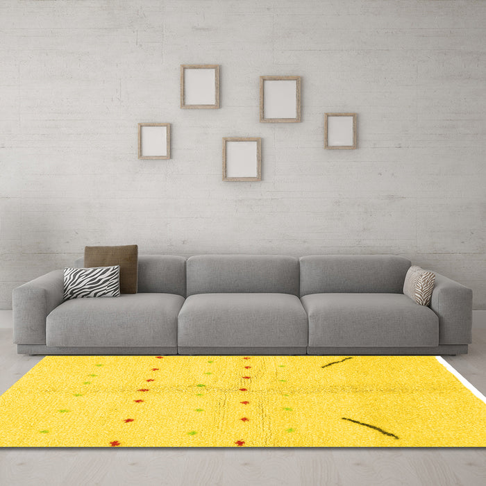 Machine Washable Solid Yellow Modern Rug in a Living Room, wshabs1805yw