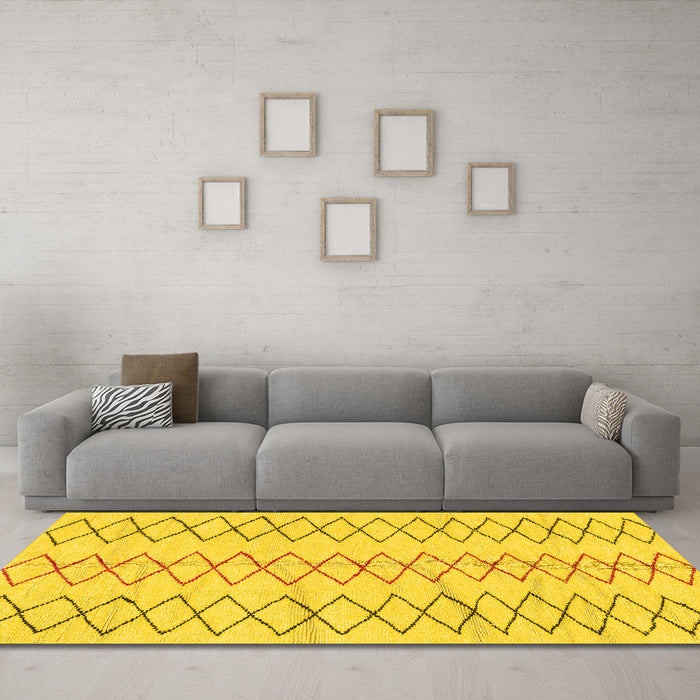 Machine Washable Solid Yellow Modern Rug in a Living Room, wshabs1806yw