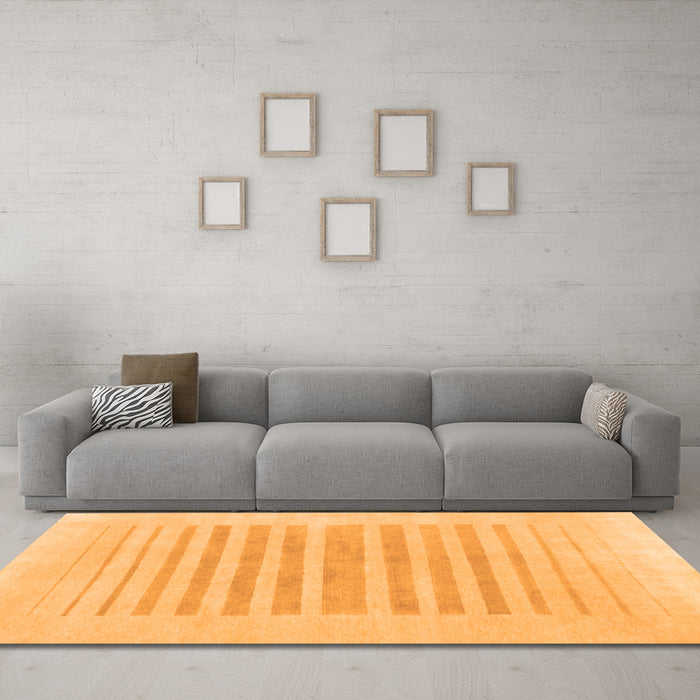 Machine Washable Solid Orange Modern Area Rugs in a Living Room, wshabs1847org