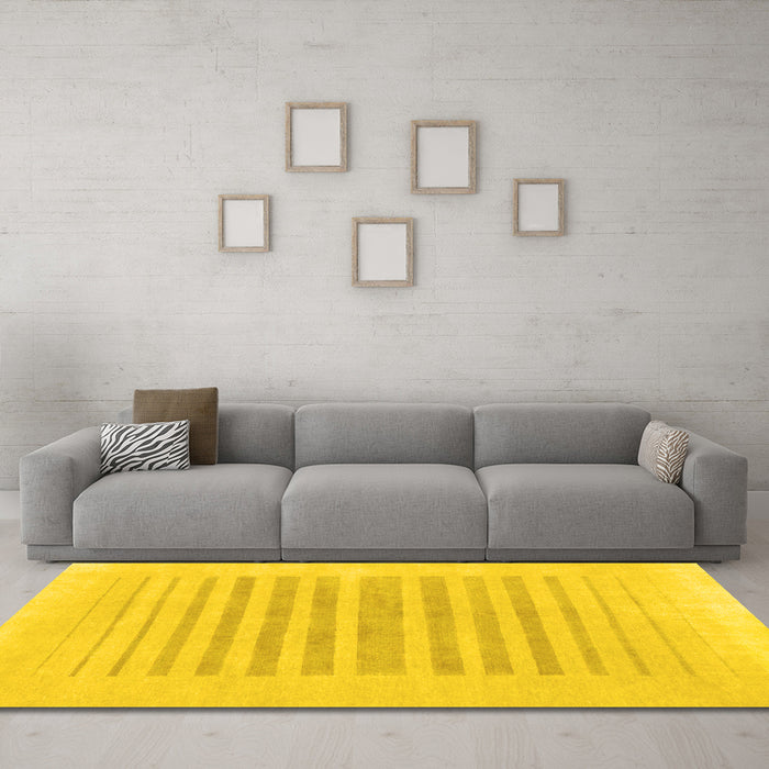 Machine Washable Solid Yellow Modern Rug in a Living Room, wshabs1847yw