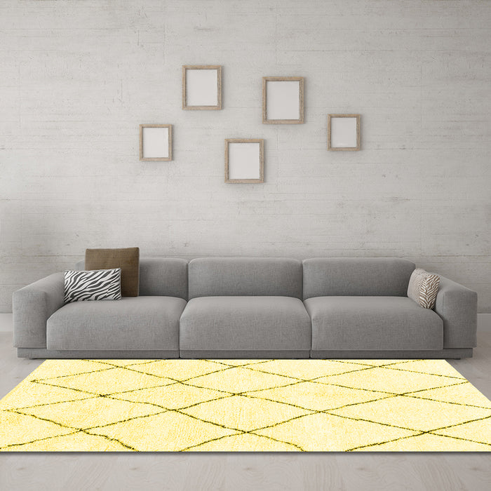 Machine Washable Solid Yellow Modern Rug in a Living Room, wshabs1848yw