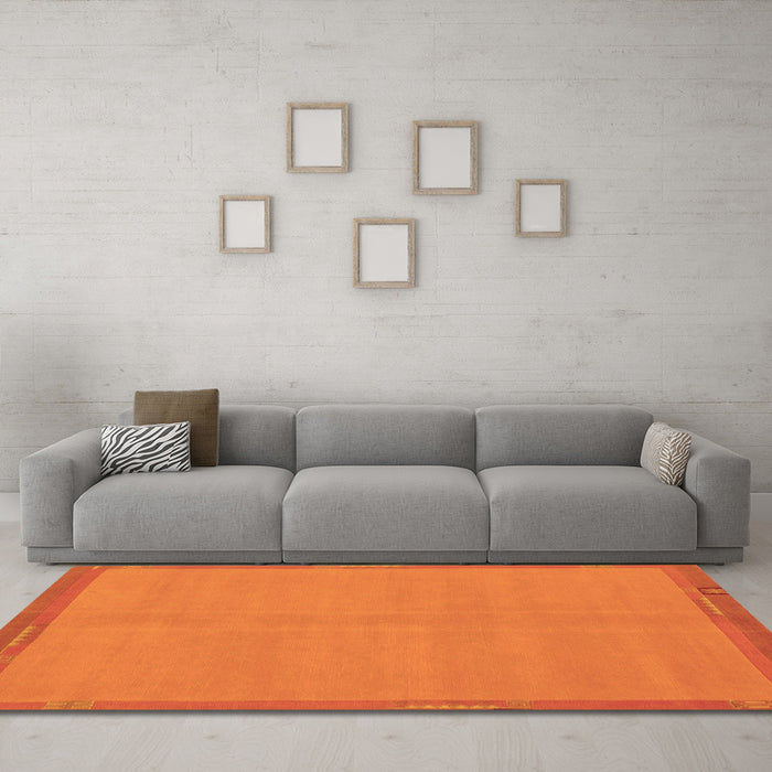 Machine Washable Abstract Orange Modern Area Rugs in a Living Room, wshabs1859org