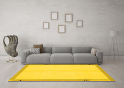 Machine Washable Solid Yellow Modern Rug in a Living Room, wshabs1870yw