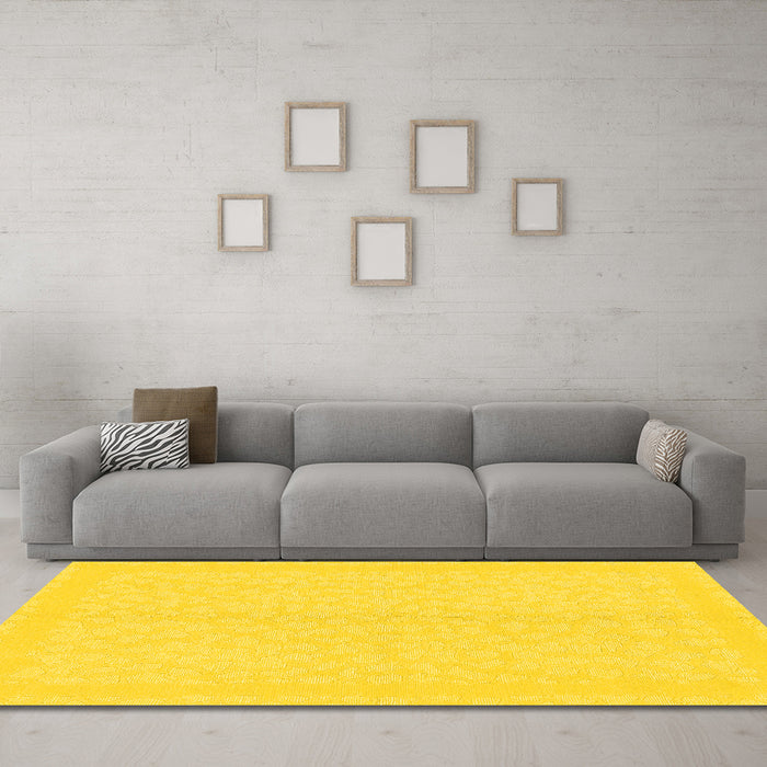 Machine Washable Solid Yellow Modern Rug in a Living Room, wshabs1876yw