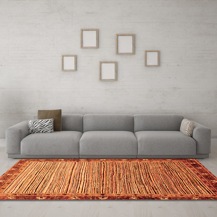 Machine Washable Abstract Orange Modern Area Rugs in a Living Room, wshabs1909org